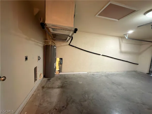 a view of a hallway with a white wall