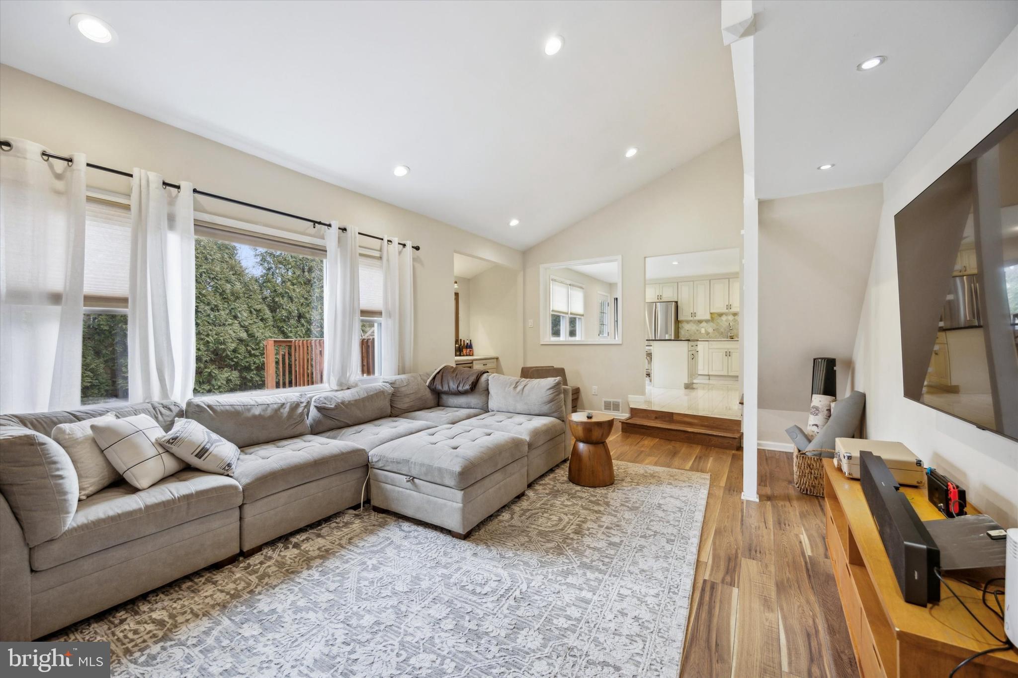 411 Silver Hill Road Cherry Hill, NJ 08002 - Photo 12 of 29 a living room with furniture and a large window