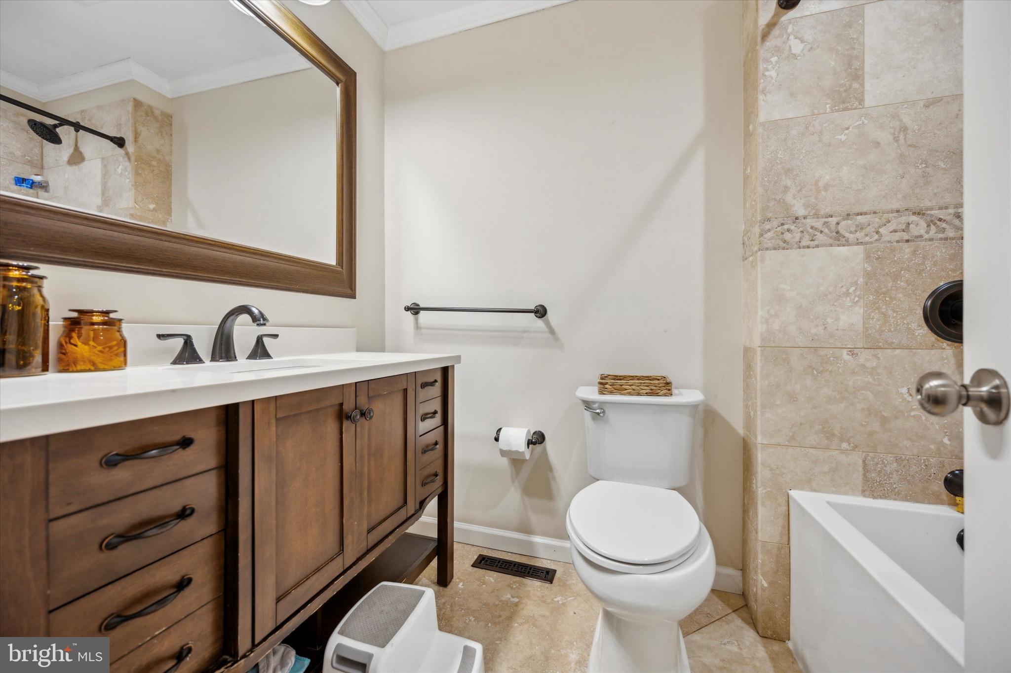 411 Silver Hill Road Cherry Hill, NJ 08002 - Photo 21 of 29 a bathroom with a sink a toilet and shower