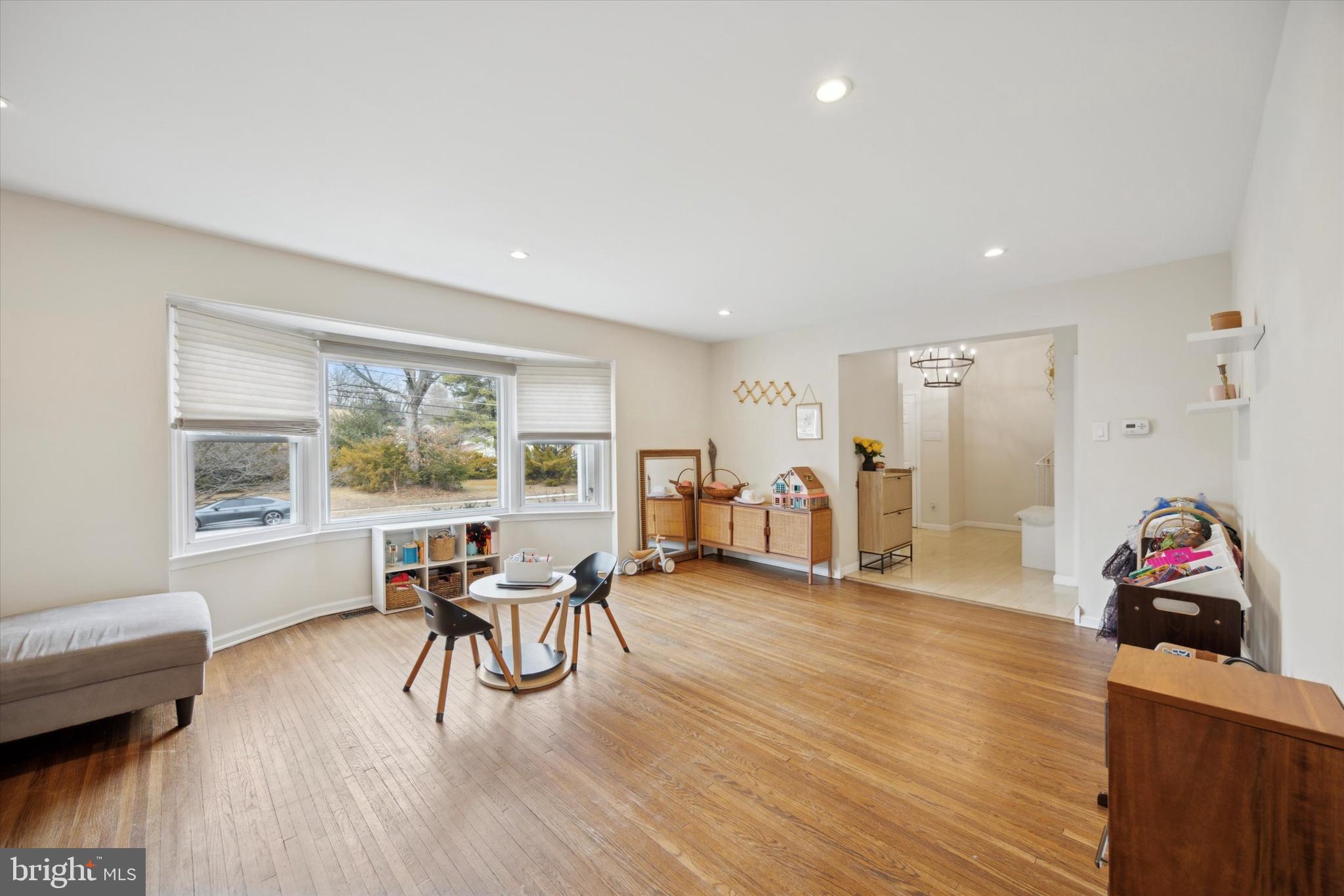 411 Silver Hill Road Cherry Hill, NJ 08002 - Photo 5 of 29 a living room with furniture and a wooden floor