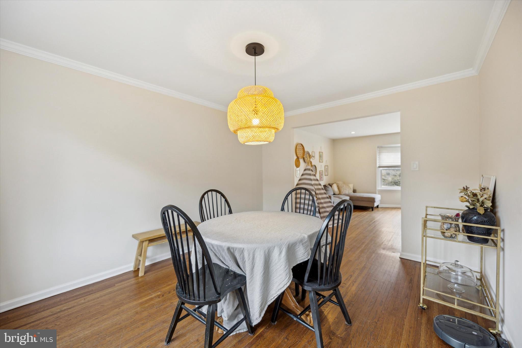 411 Silver Hill Road Cherry Hill, NJ 08002 - Photo 7 of 29 a view of a dining room with furniture and wooden floor