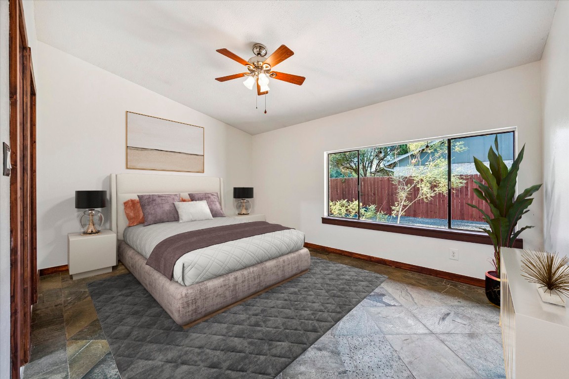 5301 Presidio Road Austin, TX 78745 - Photo 9 of 20 a bedroom with a large bed and a painting on the wall