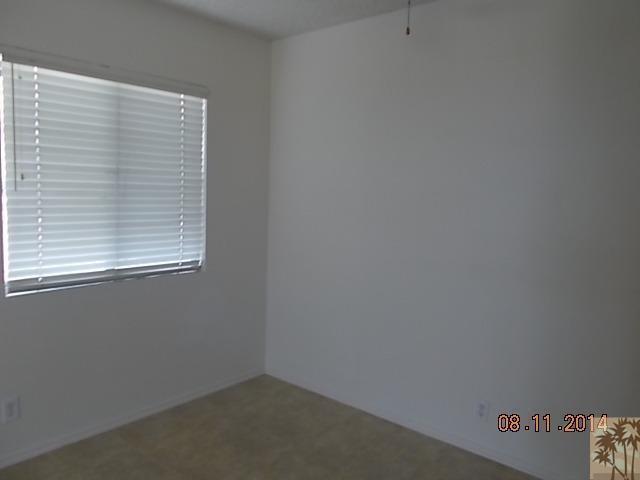 11522 Mesquite Avenue, Unit 2 Desert Hot Springs, CA 92240 - Photo 4 of 6 a small space with a window
