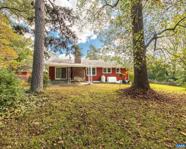 a view of a backyard with a patio