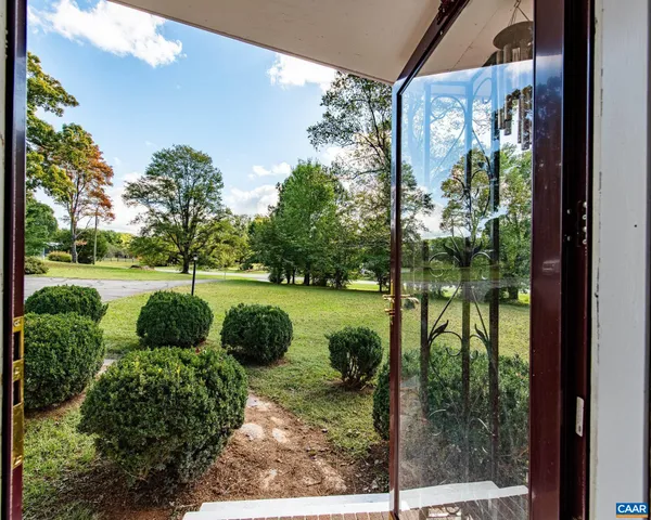 a living room with furniture and a table