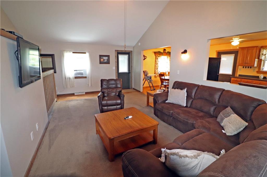 2 Miller Road Mill Run, PA 15464 - Photo 6 of 21 a living room with furniture and a flat screen tv