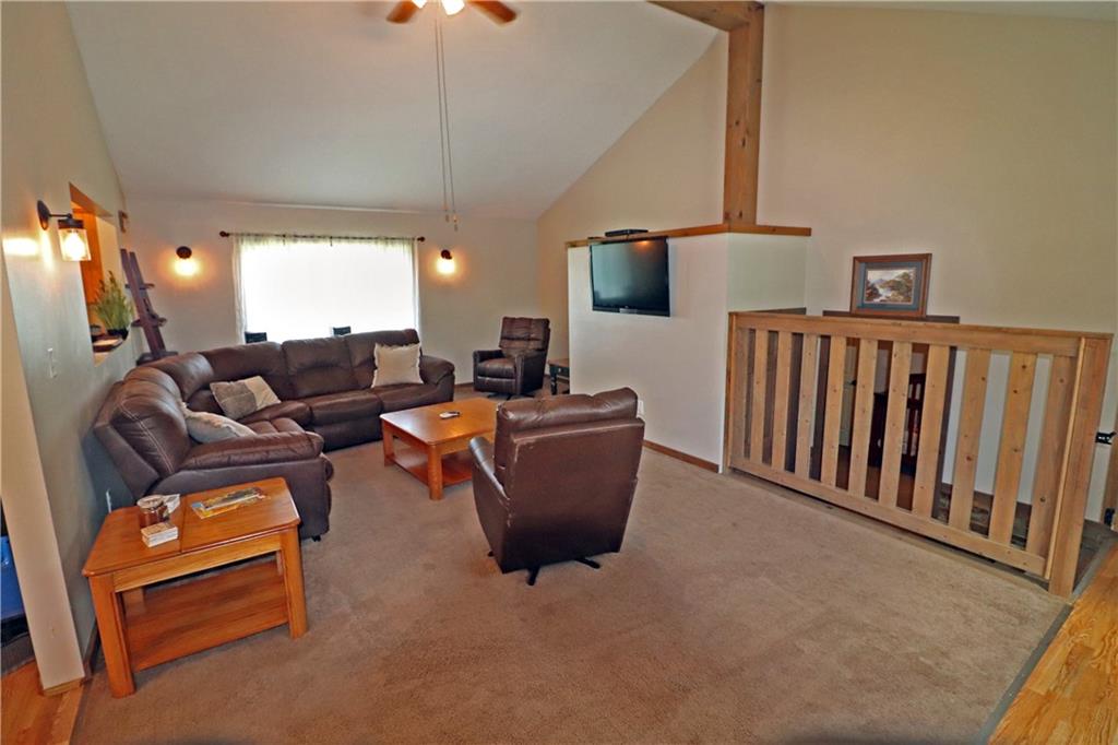 2 Miller Road Mill Run, PA 15464 - Photo 7 of 21 a living room with furniture and a flat screen tv