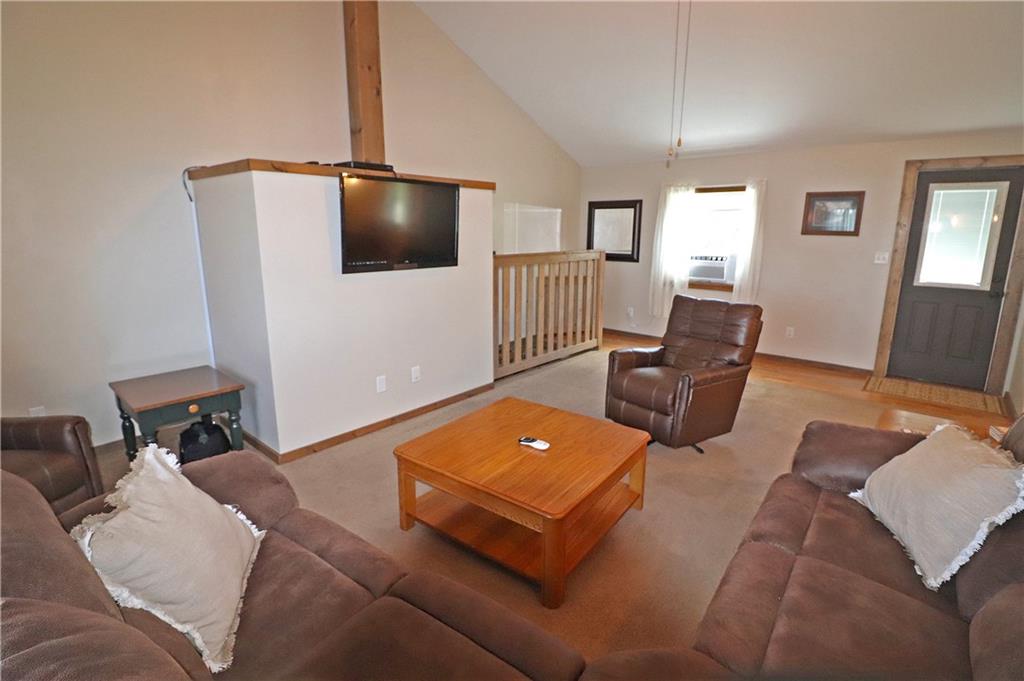 2 Miller Road Mill Run, PA 15464 - Photo 8 of 21 a living room with furniture and a flat screen tv