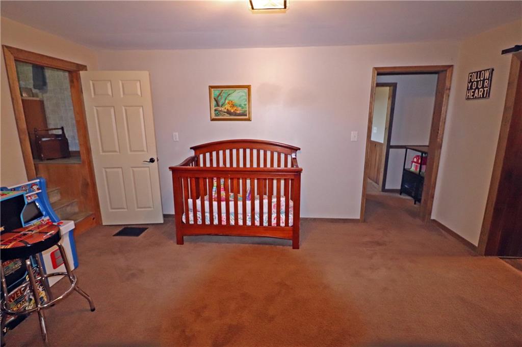 2 Miller Road Mill Run, PA 15464 - Photo 9 of 21 a view of an empty room with furniture and a window