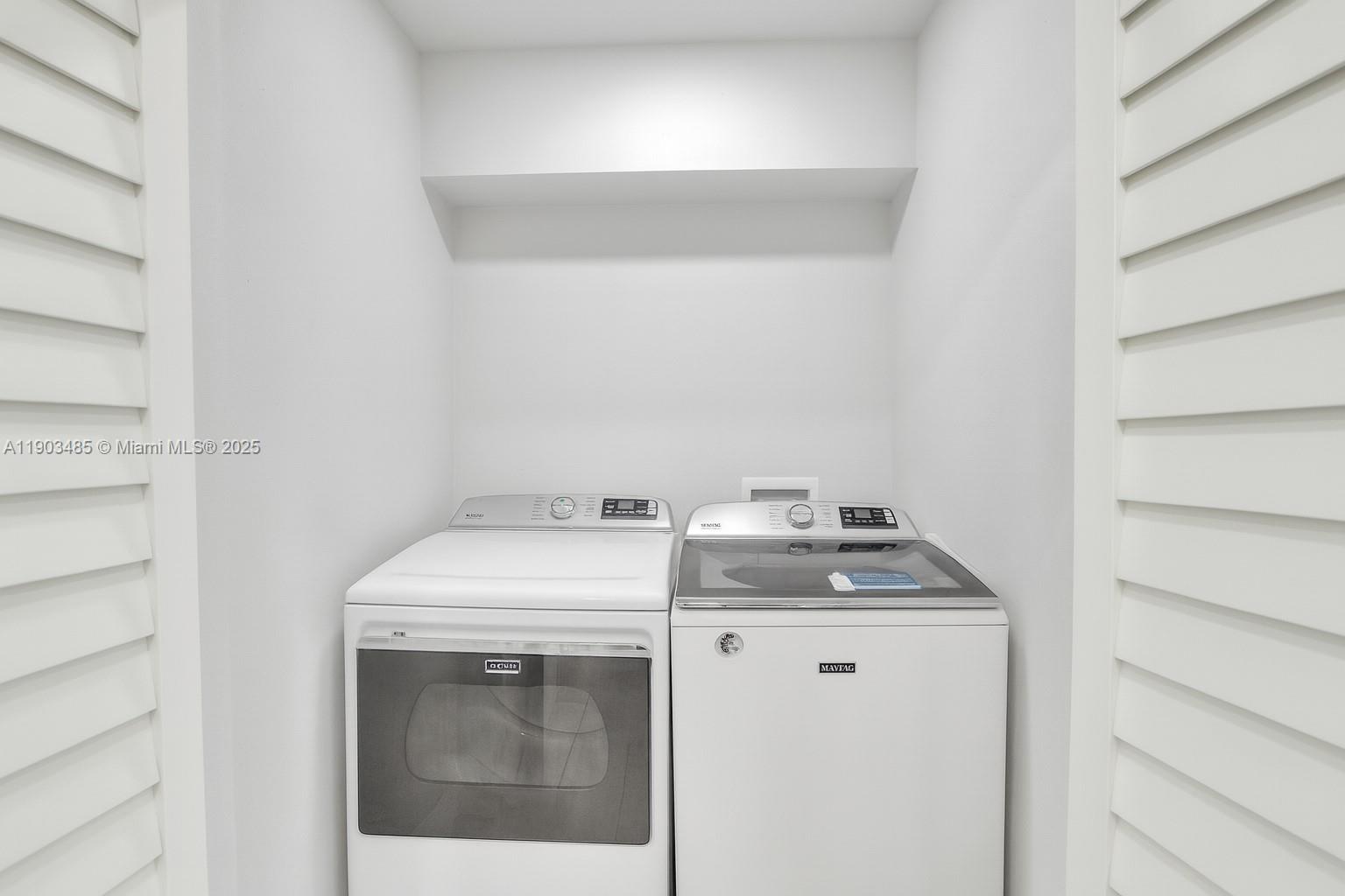 6021 Southwest 19th Street Miami, FL 33155 - Photo 14 of 20 a utility room with dryer and washer