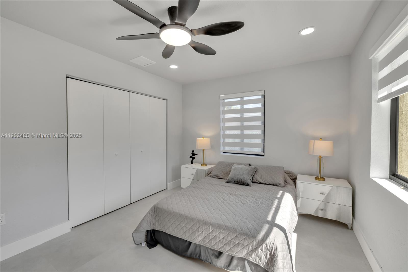 6021 Southwest 19th Street Miami, FL 33155 - Photo 8 of 20 a bedroom with a bed and a chandelier