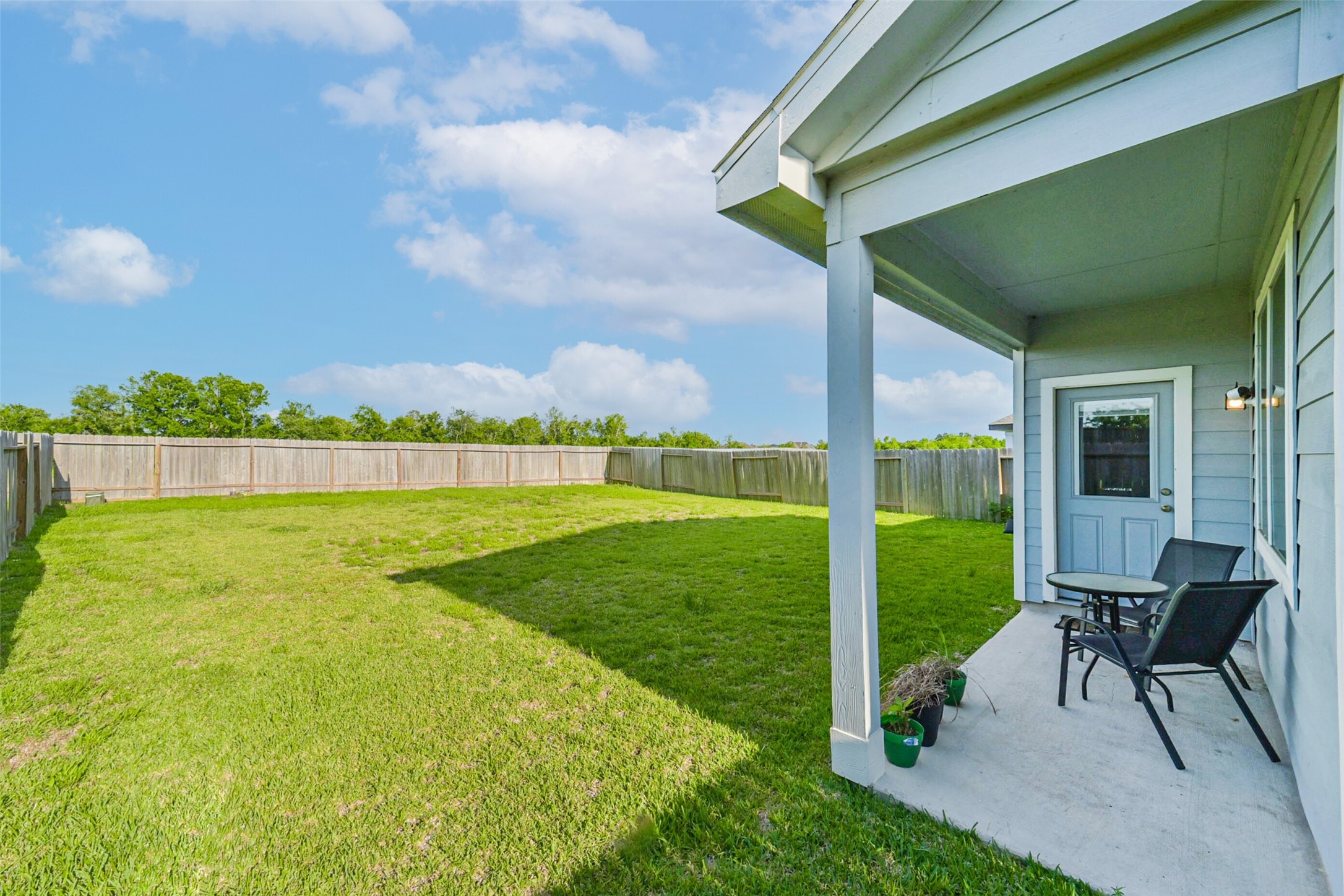 4907 Luke Matthew Drive Rosharon, TX 77583 - Photo 34 of 42 a view of backyard with swimming pool and seating