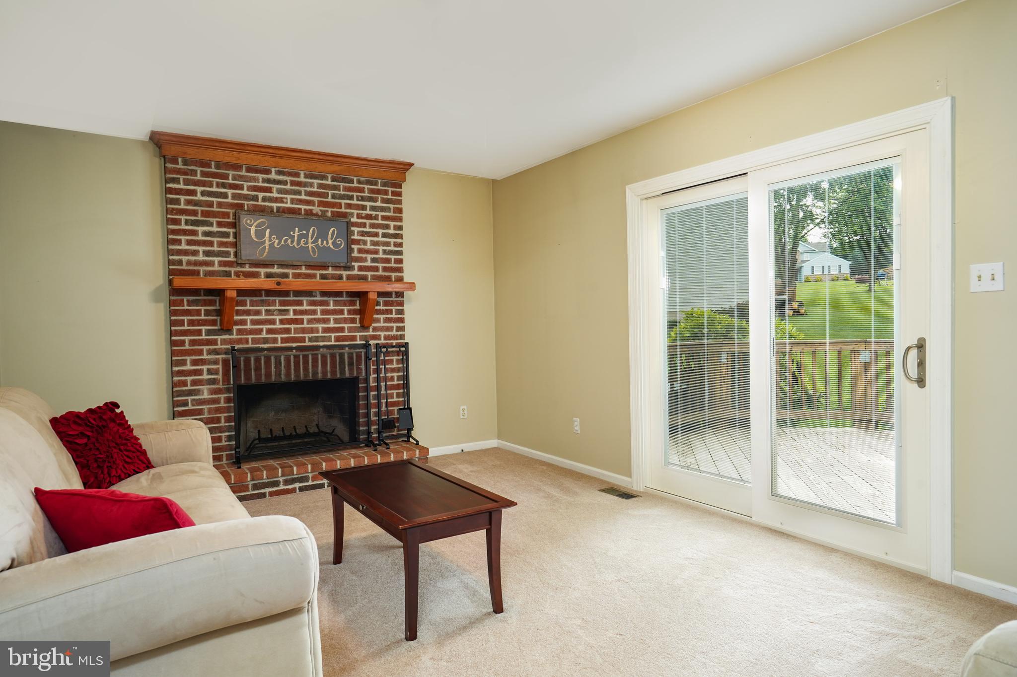 79 Stratton Circle Elkton, MD 21921 - Photo 13 of 28 Cozy den with brick fireplace and sliders to deck