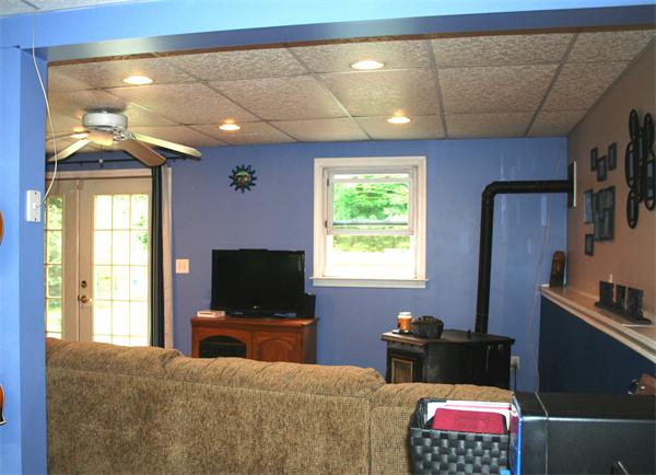 132 Union Road Wales, MA 01081 - Photo 18 of 25 a living room with furniture and a flat screen tv