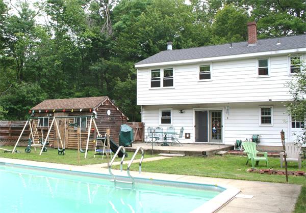132 Union Road Wales, MA 01081 - Photo 21 of 25 a house view with a garden space