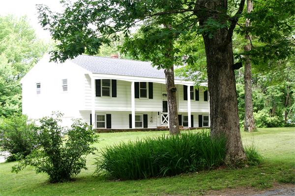 132 Union Road Wales, MA 01081 - Photo 23 of 25 a front view of a house with a yard