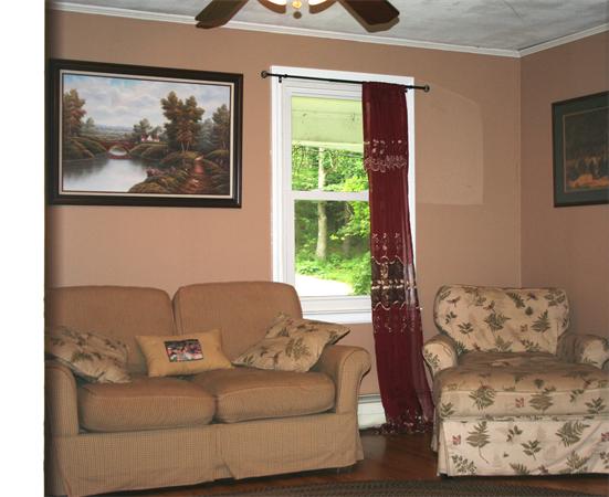 132 Union Road Wales, MA 01081 - Photo 8 of 25 a living room with furniture and a window