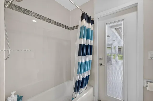 a view of large trees with a big yard