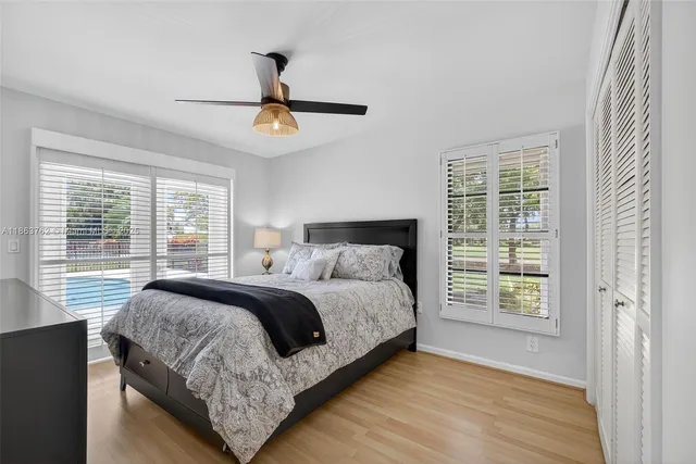 an aerial view of a house with yard