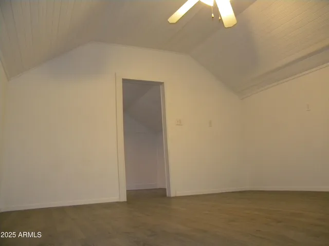 a white stove top oven sitting inside of a kitchen