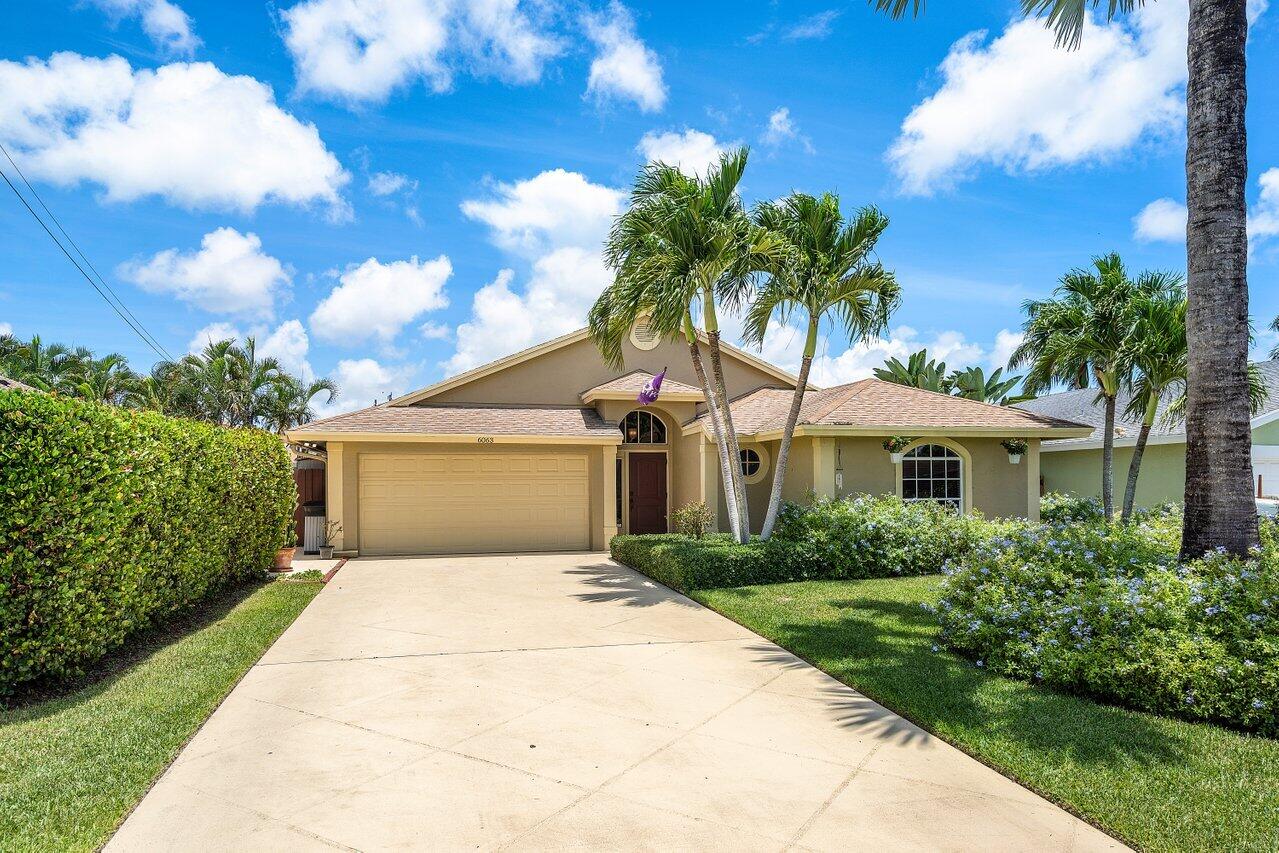 6063 Barbara Street Jupiter, FL 33458 - Photo 1 of 26 Front