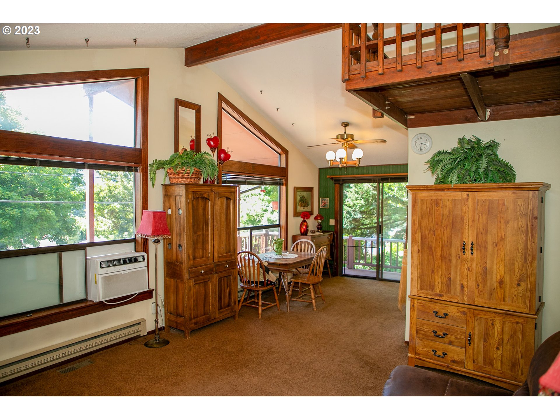 100 Southwest Wasco Street Cascade Locks, OR 97014 - Photo 3 of 21 a view of living room with furniture and large windows