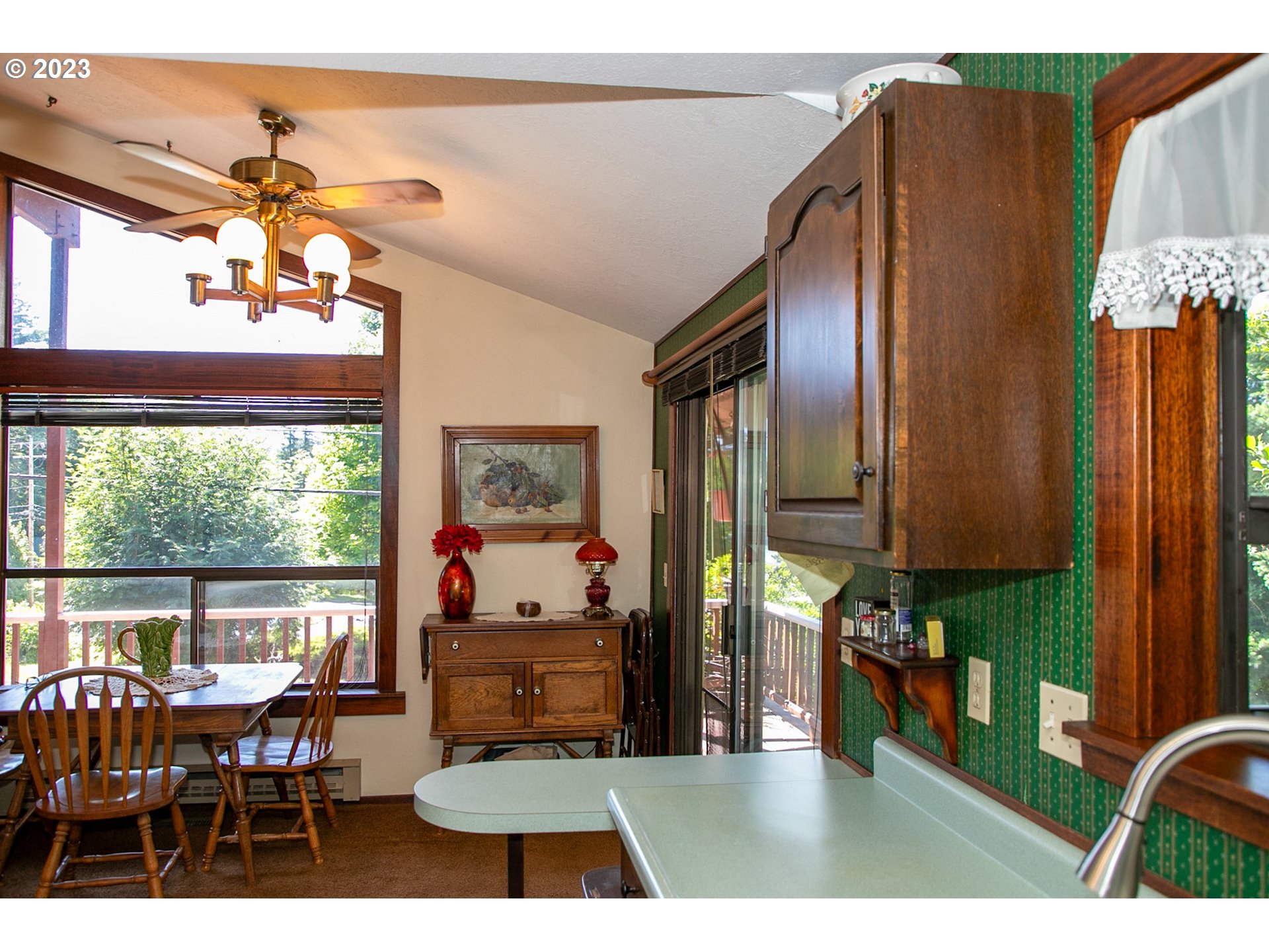 100 Southwest Wasco Street Cascade Locks, OR 97014 - Photo 4 of 21 a view of a dining room with furniture window and outside view
