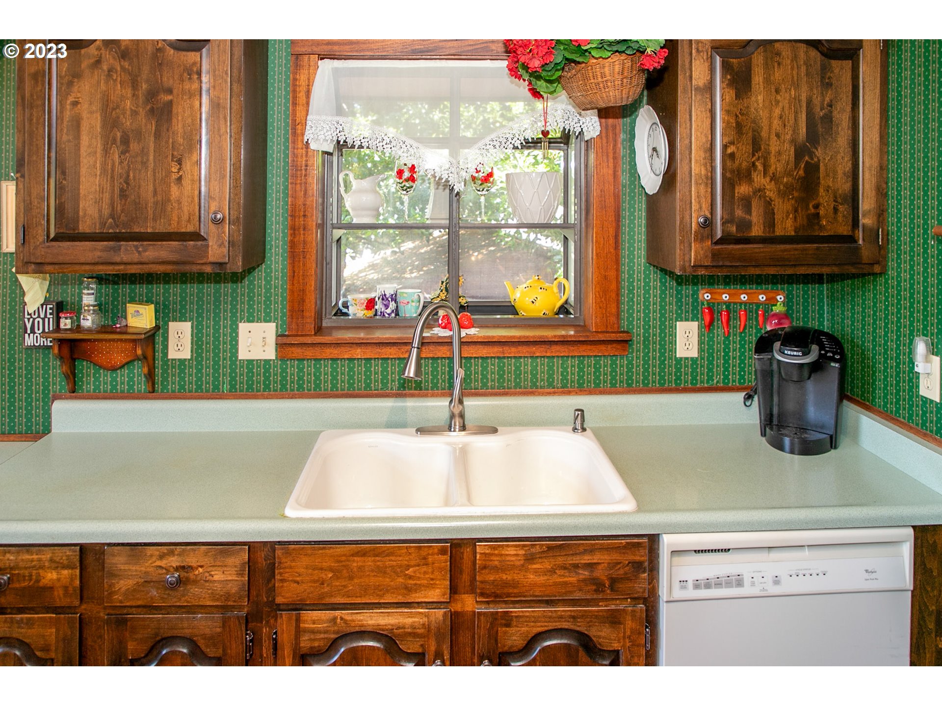100 Southwest Wasco Street Cascade Locks, OR 97014 - Photo 8 of 21 a kitchen with a sink and a microwave