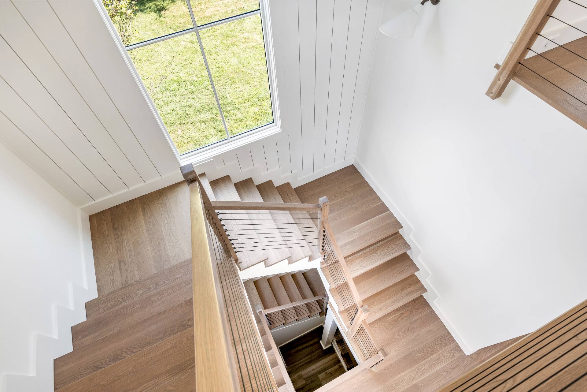 222 White Street Southampton, NY 11968 - Photo 12 of 28 a view of staircase with white walls and a window