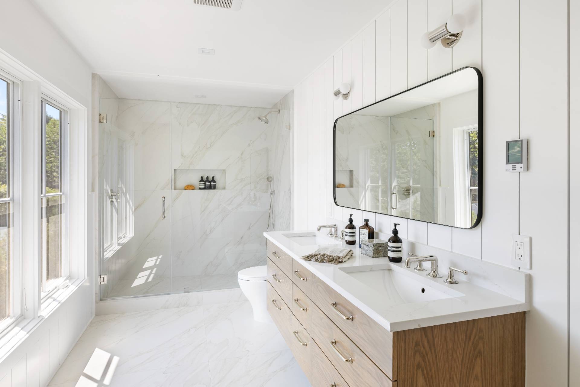 222 White Street Southampton, NY 11968 - Photo 16 of 28 a bathroom with a double vanity sink mirror and double