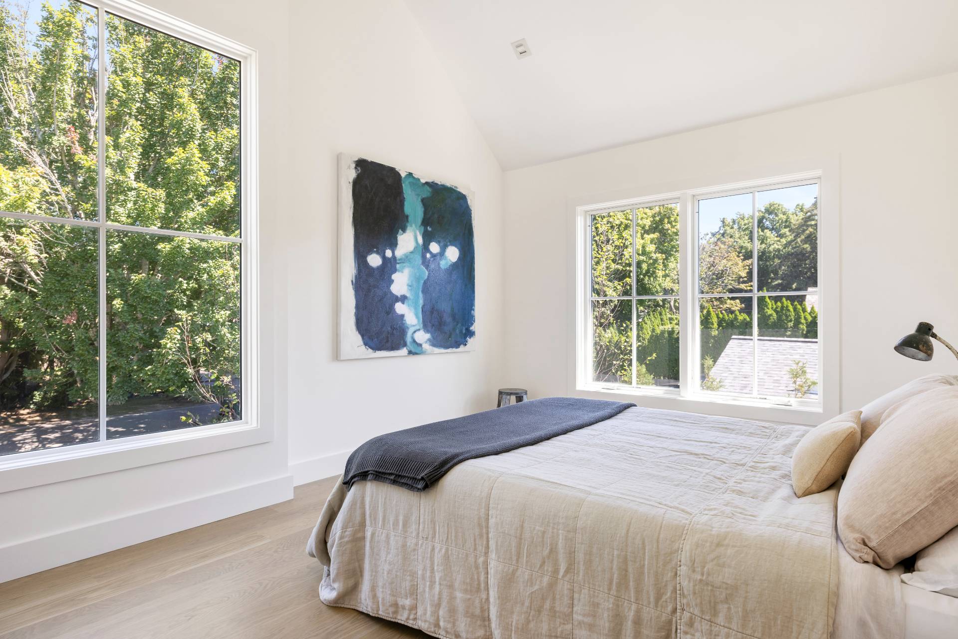 222 White Street Southampton, NY 11968 - Photo 19 of 28 a bedroom with a bed and a large window