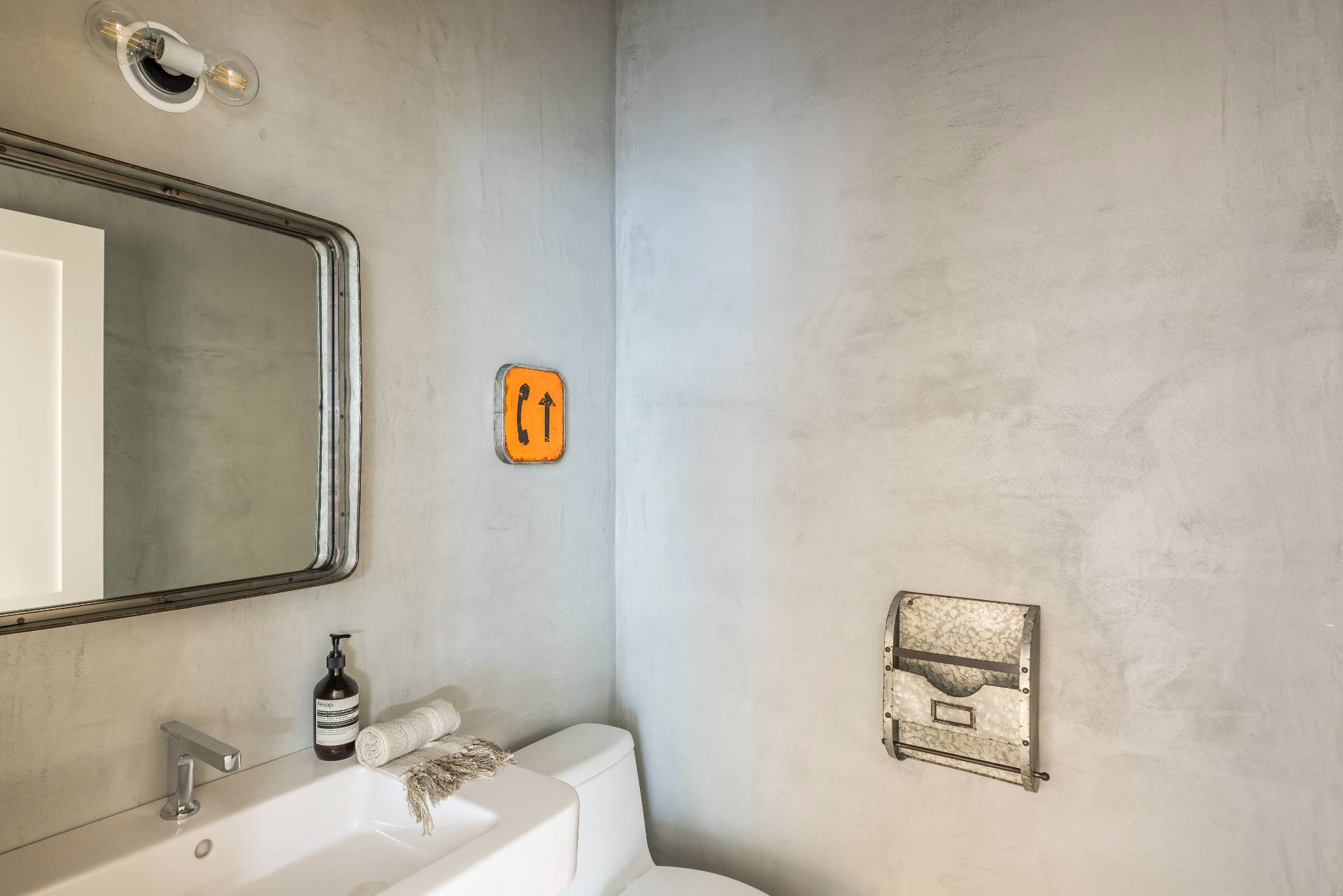 222 White Street Southampton, NY 11968 - Photo 26 of 28 a bathroom with a sink mirror and vanity