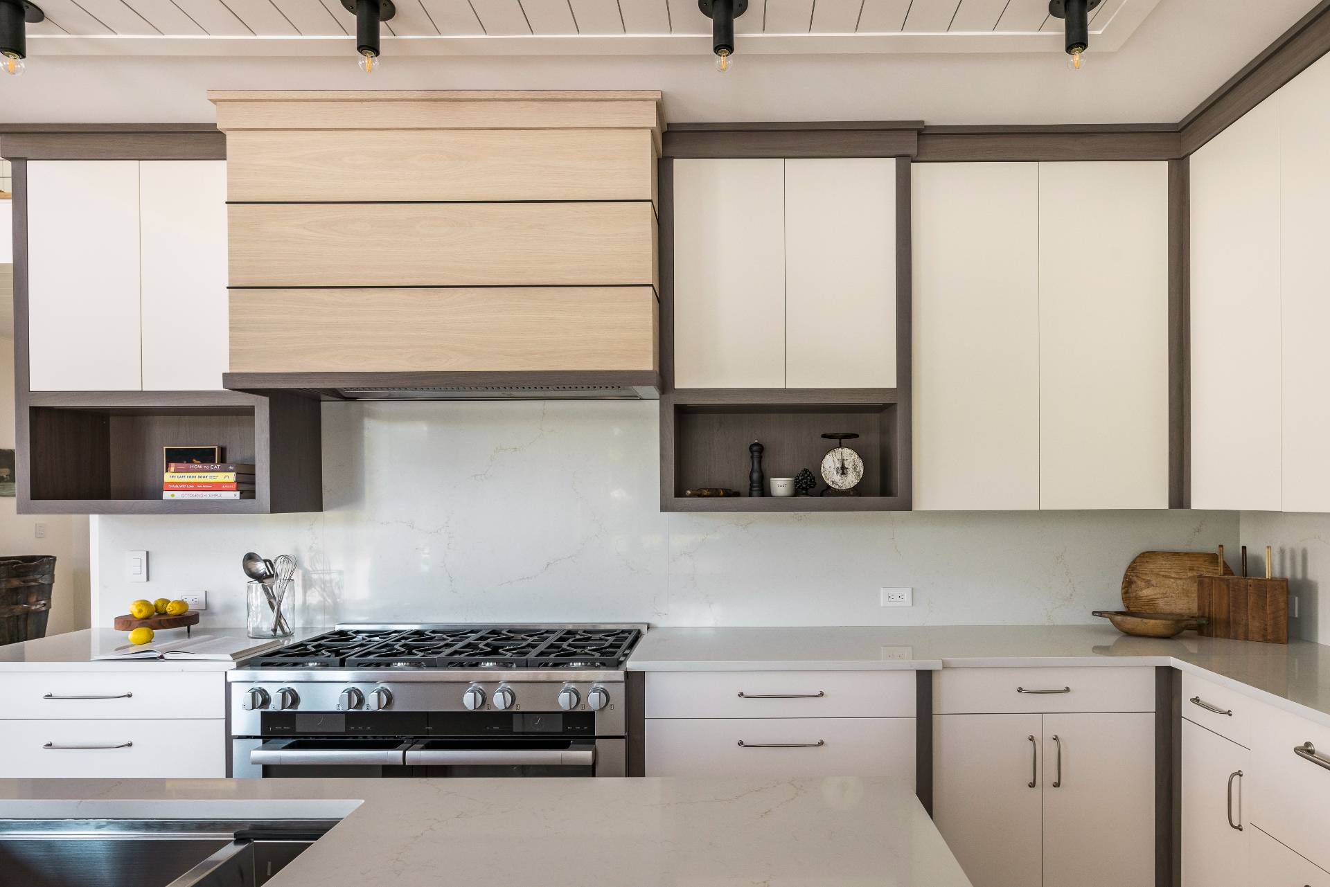 222 White Street Southampton, NY 11968 - Photo 6 of 28 a kitchen with stainless steel appliances a stove and a microwave