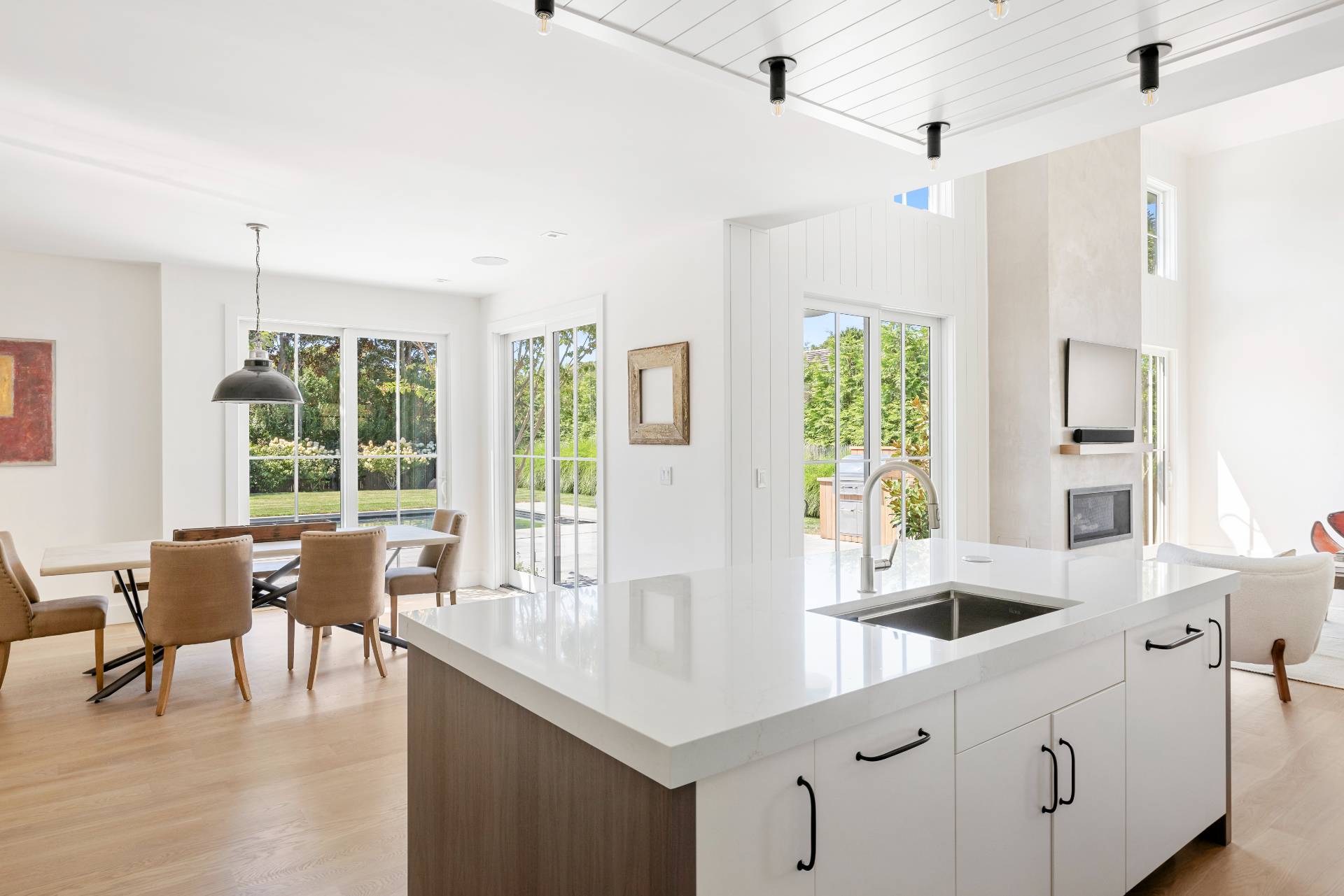 222 White Street Southampton, NY 11968 - Photo 7 of 28 a kitchen with counter top space and wooden floor