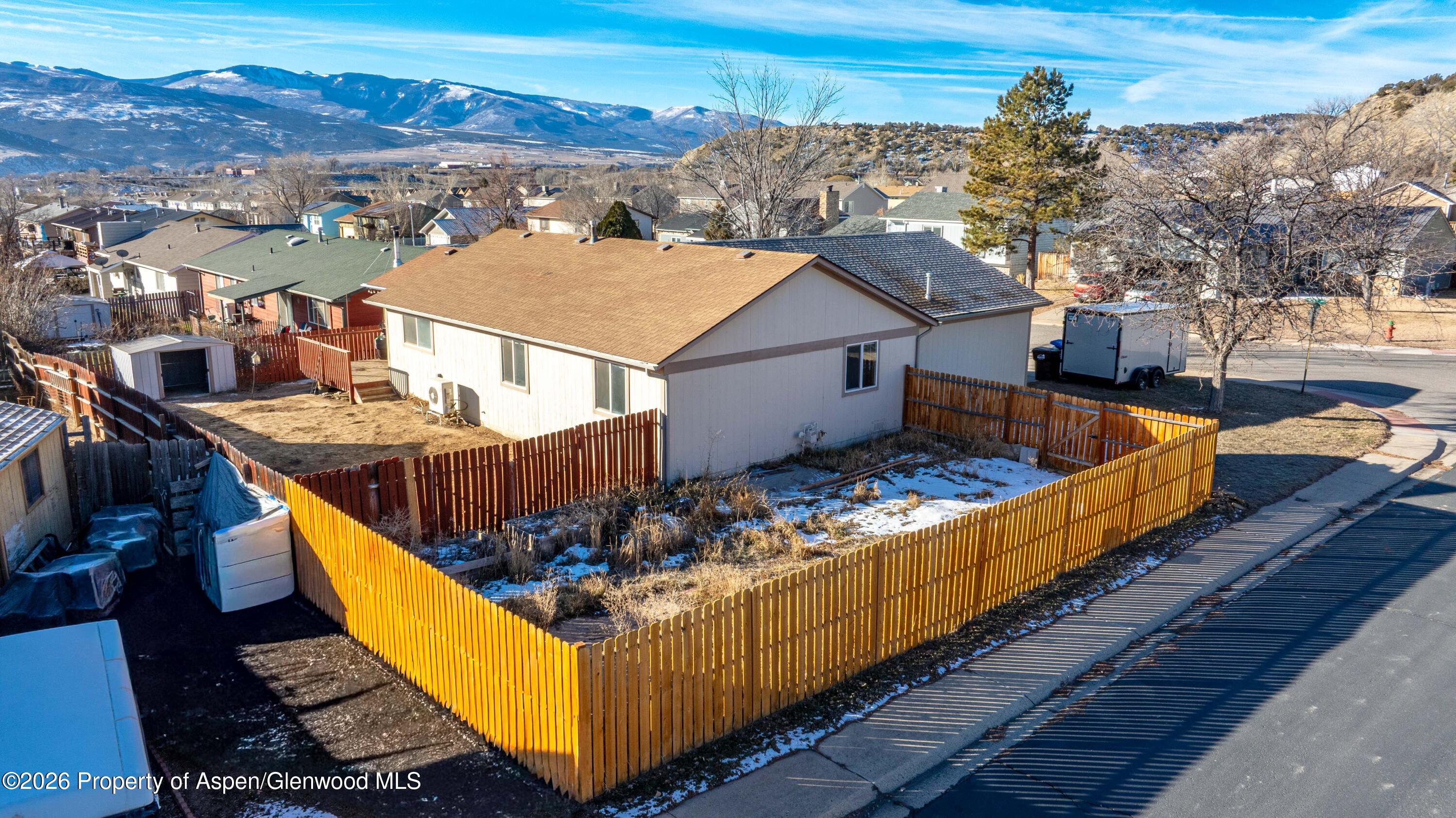 2820 West Avenue Rifle, CO 81650 - Photo 16 of 20 an aerial view of a house having swimming pool