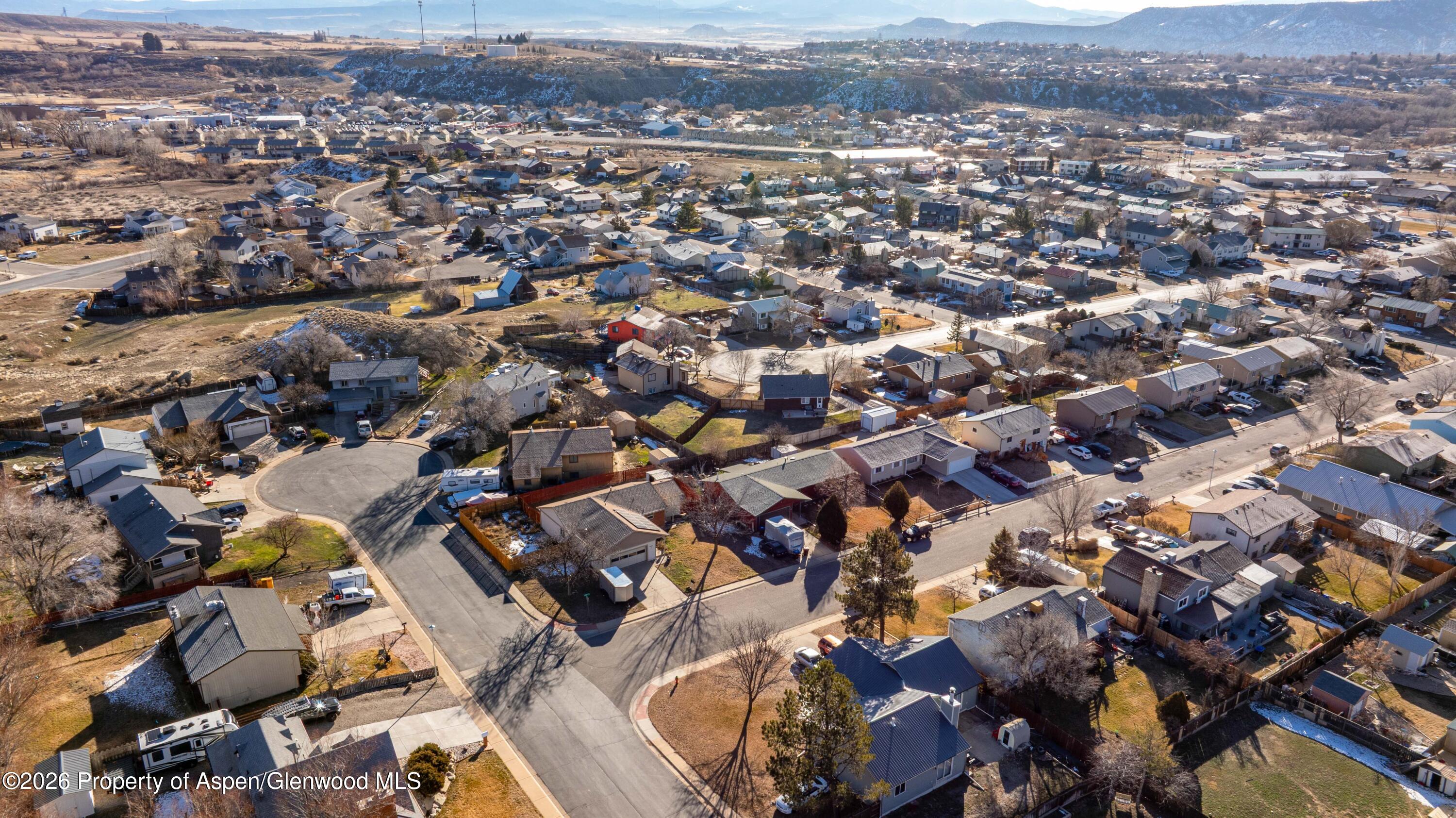 2820 West Avenue Rifle, CO 81650 - Photo 19 of 20 an aerial view of a city with lots of residential buildings