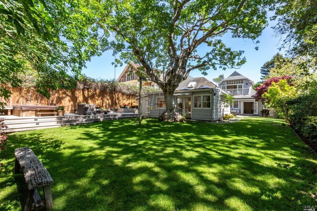22 Sycamore Avenue Mill Valley, CA 94941 - Photo 1 of 1 a front view of a house with a garden