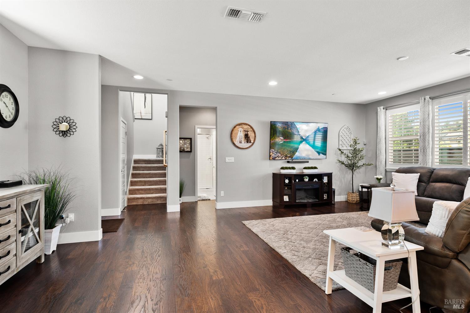 5453 Kaitlyn Place Rohnert Park, CA 94928 - Photo 12 of 41 As the vibrant heart of the home, the open-concept living area seamlessly connects the chef-inspired kitchen to the main living and dining spaces, ensuring you're always part of the conversation.