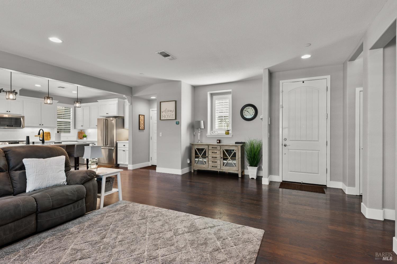 5453 Kaitlyn Place Rohnert Park, CA 94928 - Photo 13 of 41 The main level boasts high-quality upgraded flooring that unifies the space and stands up to daily living.