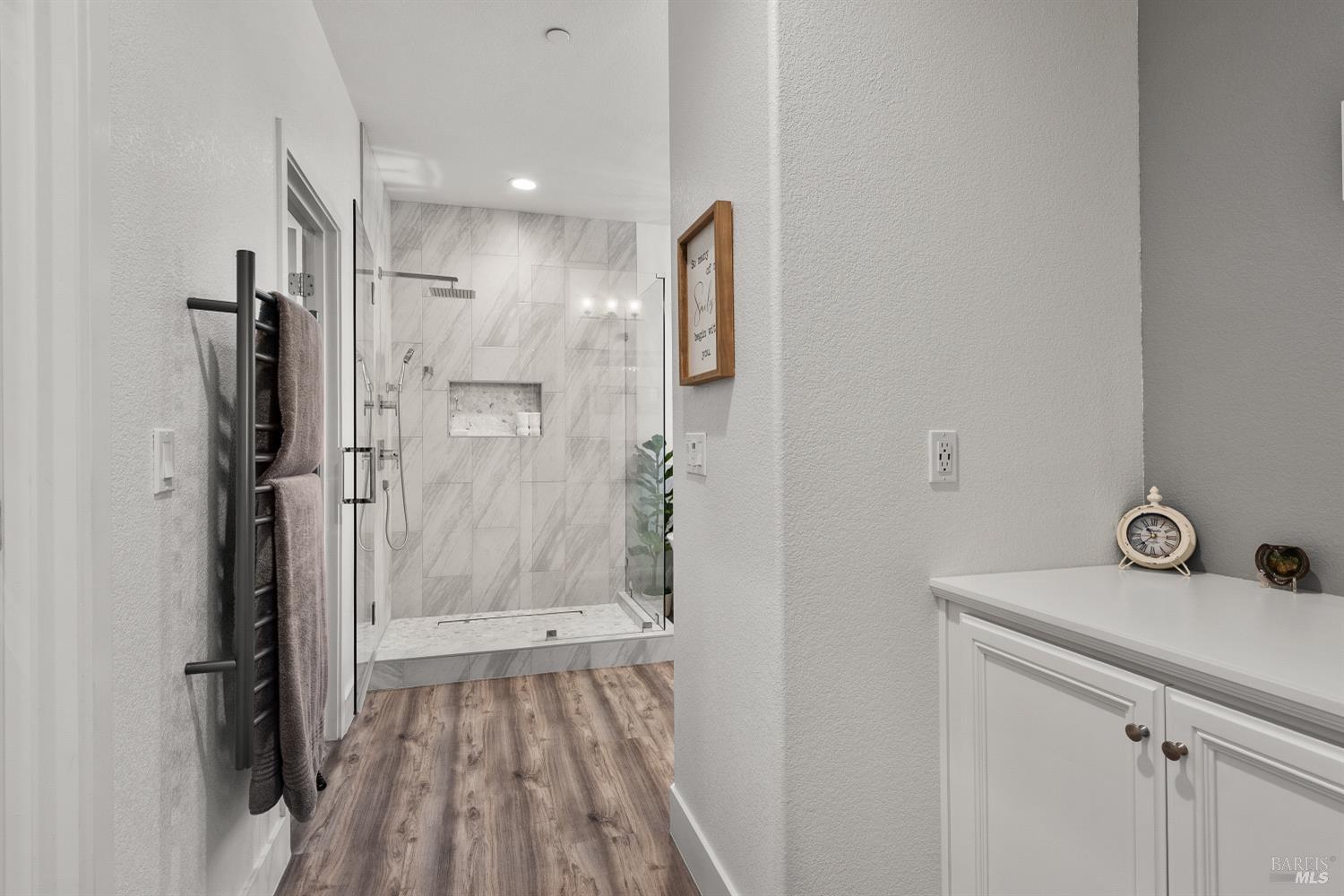 5453 Kaitlyn Place Rohnert Park, CA 94928 - Photo 23 of 41 The upgraded countertops, cabinetry, and flooring create a cohesive and high-end feel that matches the quality found throughout the home.