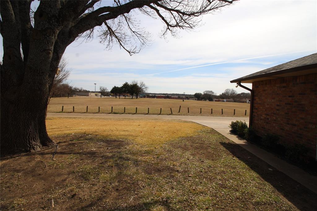 634 Ray Avenue DeSoto, TX 75115 - Photo 28 of 28 View of yard featuring fence and a rural view
