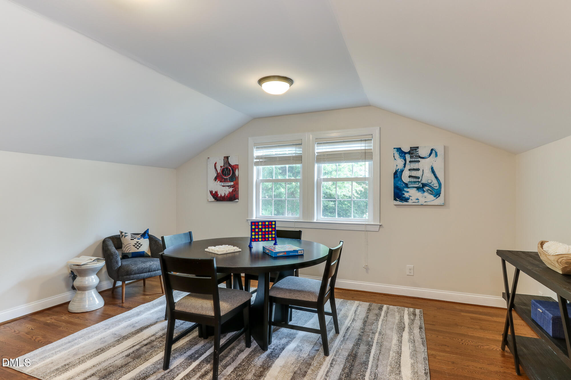 604 Mills Street Raleigh, NC 27608 - Photo 25 of 39 a view of a dining room with furniture window and outside view