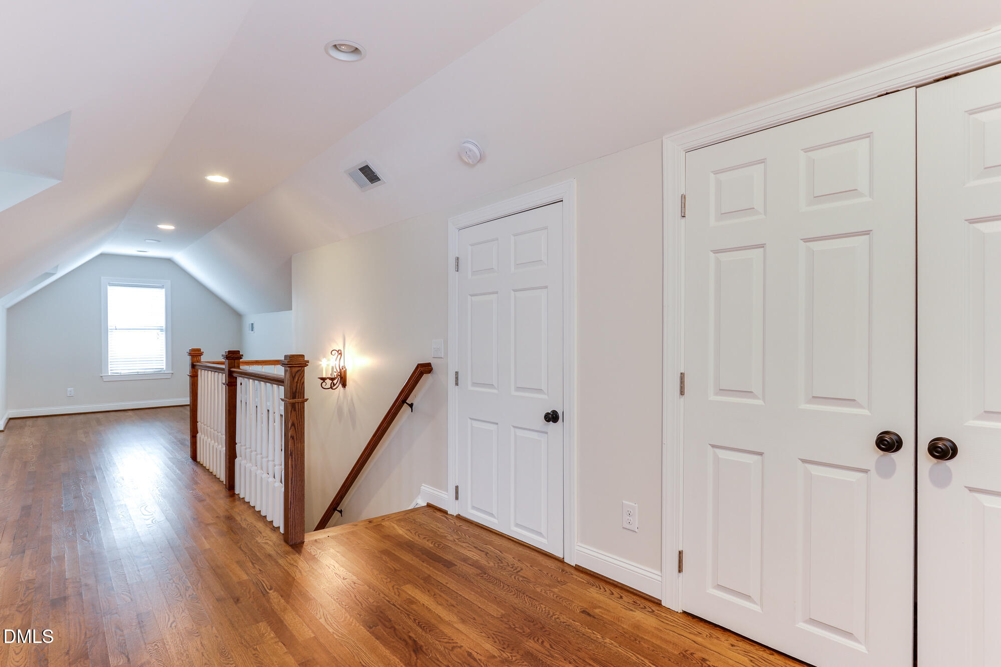604 Mills Street Raleigh, NC 27608 - Photo 33 of 39 a view of a hallway with wooden floor