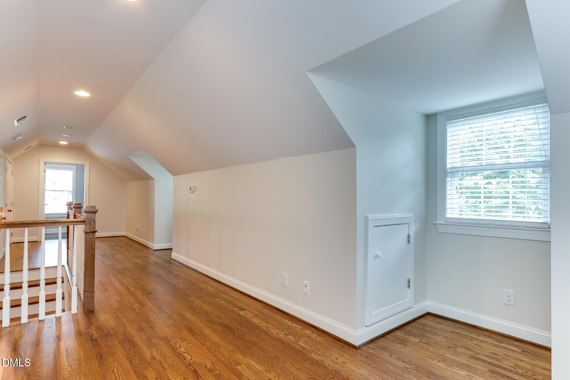 604 Mills Street Raleigh, NC 27608 - Photo 35 of 39 a view of entryway with wooden floor