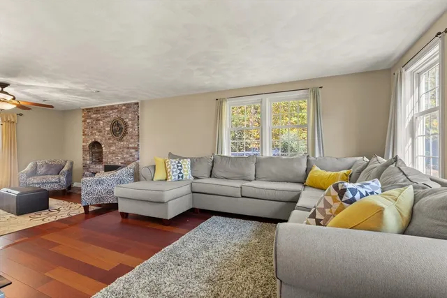 a living room with furniture and windows