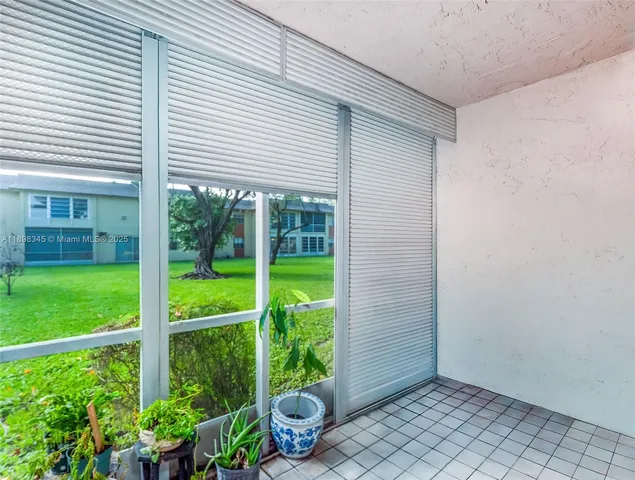 a view of a backyard with garden