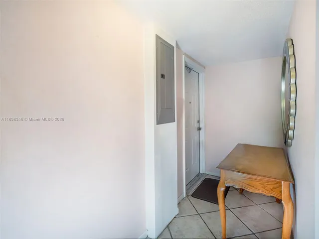 a room that has a bed and a chair in it