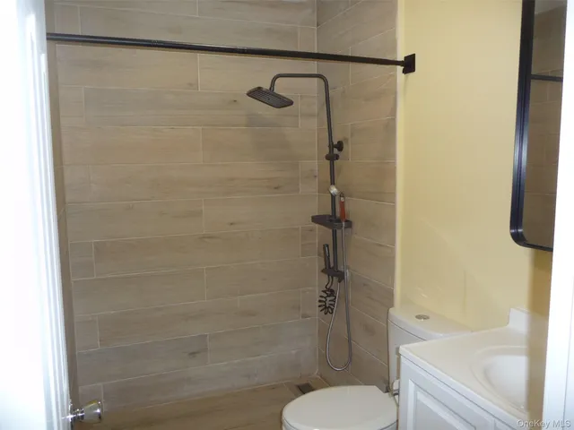a bathroom with a sink and mirror