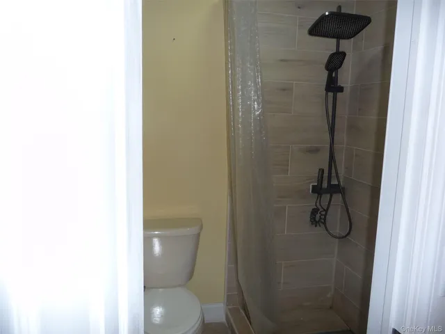 a view of a kitchen from the hallway