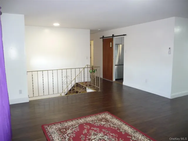 a view of hallway with closet